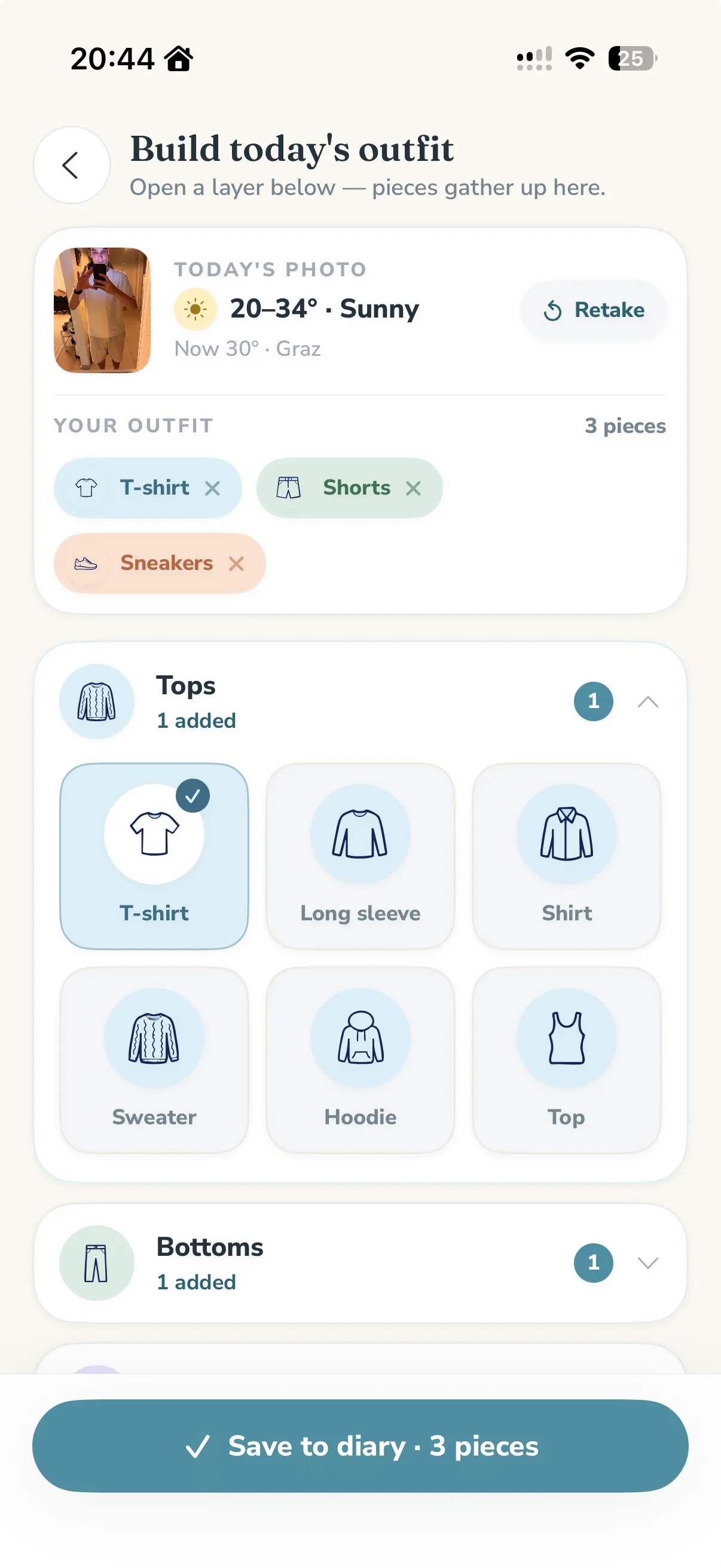 The outfit builder mid-log: today’s weather (20–34°, sunny, Graz) attached to a mirror photo, three chosen pieces (T-shirt, Shorts, Sneakers) gathered above the garment-icon picker, and a “Save to diary · 3 pieces” button.