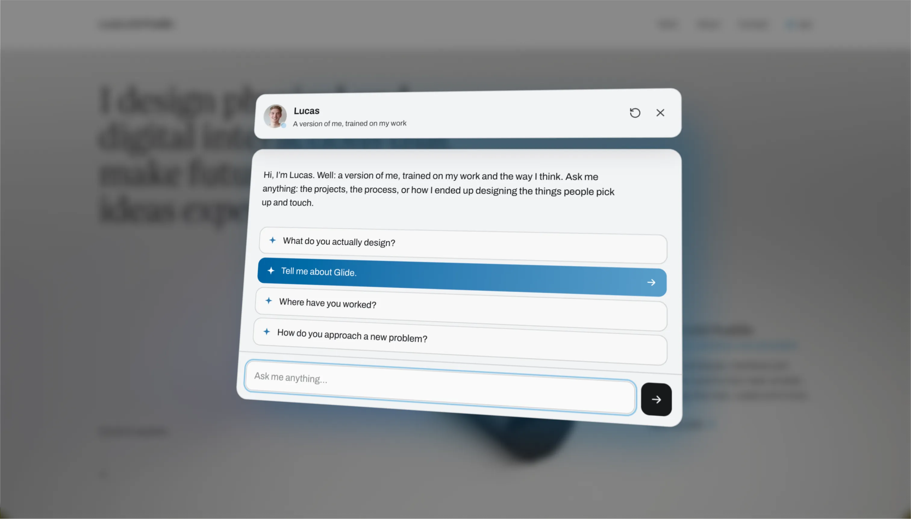 The Lucas-Bot conversation overlay open on the site, its greeting introducing itself as a version of Lucas trained on his work.