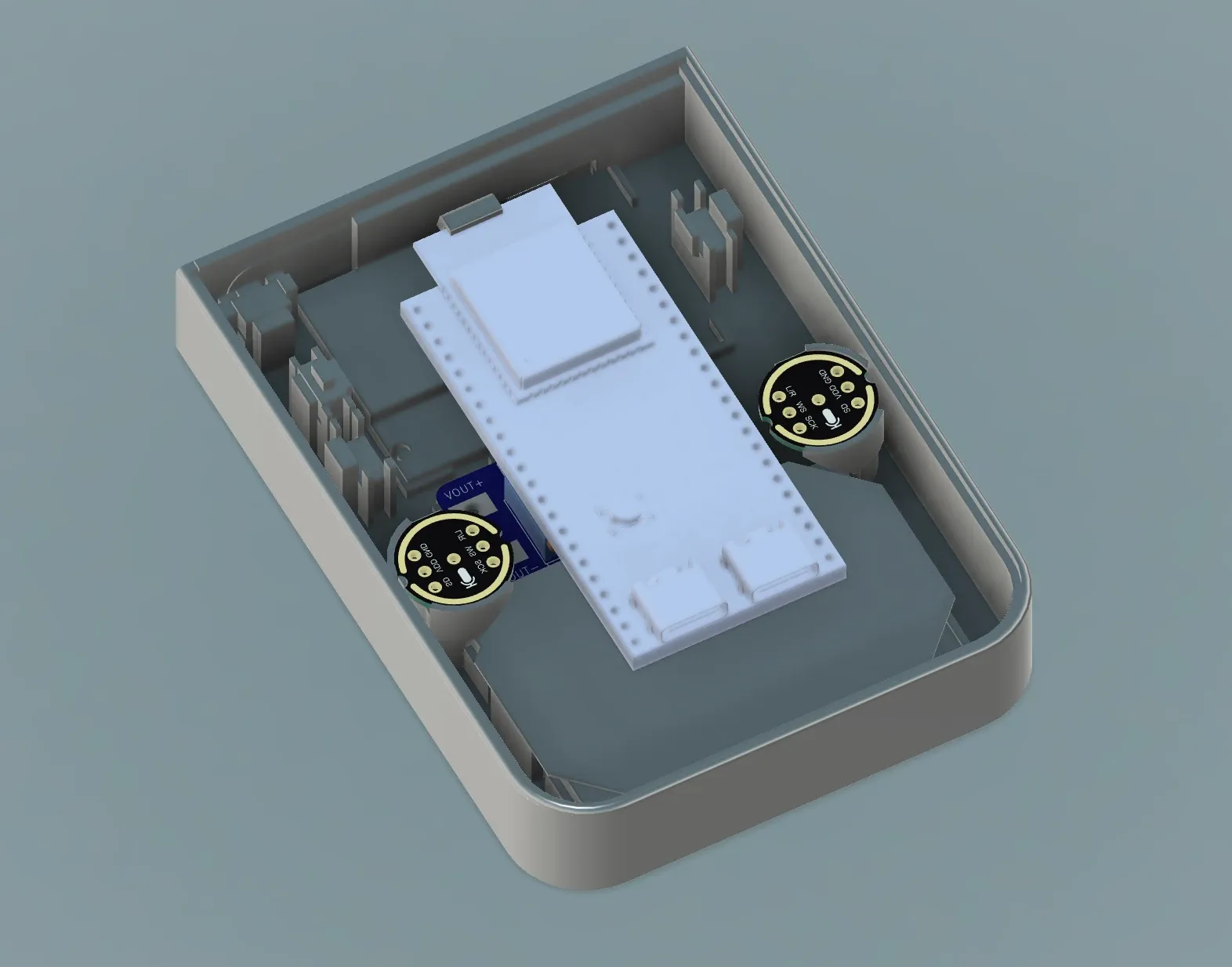 CAD section of the V1 shell from above: the ESP32-S3 board in the middle, flanked by two round microphones.