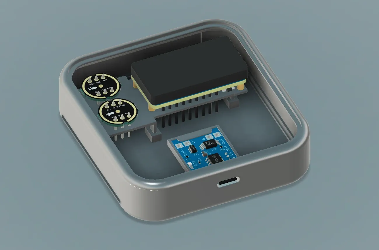 CAD view into the V2 body: two microphones, the display board and the charging module packed into the rounded-square shell.